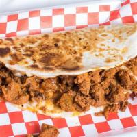 Quesadilla De Pastor (Sliced Pork) · A regular size flour tortilla filled with sliced pork and melted white cheese.  Side include...