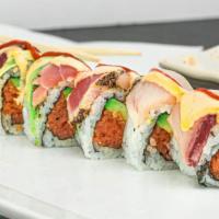 Sexy Lady Roll · Spicy tuna, avocado inside, top with black-pepper tuna and yellow tail with spicy sauce on t...