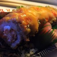 Geisha Roll · Fried soft shell crab with panko, masago and cream cheese top unagi salmon, eel sauce, spicy...
