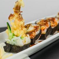 Rock'N Roll · Shrimp tempura, masago, cucumber, avocado and eel sauce.