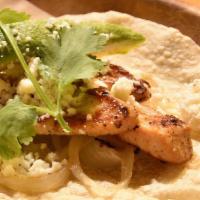Texan · Grilled chicken, caramelized onions, avocado.