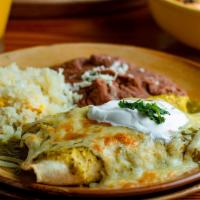 Chicken Green Enchilada · Shredded chicken, green tomatillo sauce, grated Chihuahua cheese and fresh cream. 2 pieces, ...