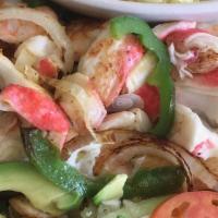 Crab Salad · Surimi meat, shrimp, onions, bell peppers, served with rice. Choice of two sides.
