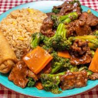 Beef Broccoli · Tender beef strips with broccoli and carrot in a brown savory sauce; Served with fried rice ...