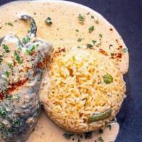 Stuffed Poblano Pepper · Stuffed with baby shrimp, scallops, crabmeat, pepper jack cheese. Then topped with Asiago sa...