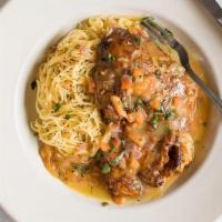 Maple Leaf Duck · Boneless smoked half duck served over linguine and with Chef's special orange sauce, diced t...