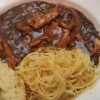 Chicken Marsala · Sautéed chicken, mushrooms, and diced tomatoes smothered in Marsala wine sauce. Served over ...