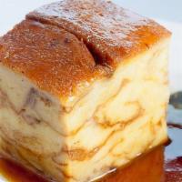 Bread Pudding · Made fresh daily and smothered in our own hot cognac sauce.
