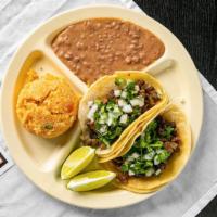 Taco Plate · Your choice of meat. Comes with rice and beans.