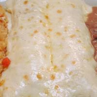 2 Enchiladas · Served in a corn tortilla with your choice of chicken or beef.