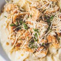 Chicken Fettuccine Alfredo  · Fettuccine noodles tossed in our Alfredo sauce. Served with a salad.