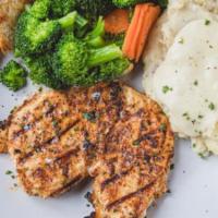 Chicken Dinner · 8 oz chicken breast served grilled or blackened. Choice of two sides.
