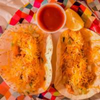 Chicken Street Tacos (2) · Grilled chicken topped with pico de gallo on a soft flour tortilla sprinkled, with cheese.