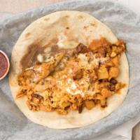 John Special · Scrambled eggs & potatoes, chorizo, refried beans, topped with queso, on a flour tortilla.