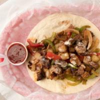 Beef Fajita · Grilled beef fajita, grilled onions & bell peppers, roasted potatoes, topped with queso, on ...