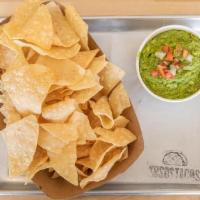Guacamole & Chips · Homemade chips & our fresh guacamole, topped with pico de gallo.