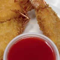 Fried Shrimp · crispy butterflied shrimps with sweet and sour sauce on side.