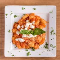 Potato Gnocchi Sorrentina · Potato gnocchi with fresh mozzarella, tomato sauce, and fresh basil