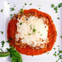 Lasagna Bolognese · Traditional Lasagna with Bolognese ground beef tomato sauce, ricotta, parmesan cheese