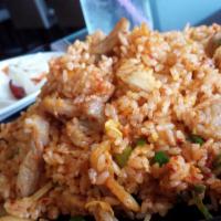 Kimchi Fried Rice · Spicy. Stir-fried kimchi, eggs & fried rice.