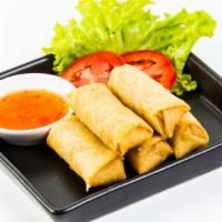 Spring Rolls · Classic, fresh spring rolls filled with slaw, corn, and green onion. Served with side of swe...