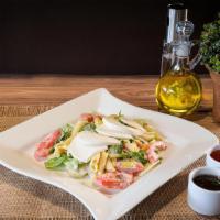 Little Rome Salad · Fresh tomatoes, penne pasta, fresh mozzarella cheese, romaine lettuce, broccoli, mushrooms w...