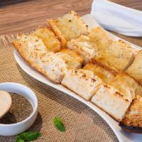 Garlic Bread · French bread with a butter garlic mix.