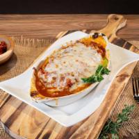 Lasagna · Traditional three layers of lasagna sheets pasta stuffed with premium ground beef, mozzarell...