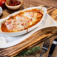 Stuffed Shells · Jumbo pasta shells with ricotta, mozzarella and Parmesan cheese showered in our signature ma...