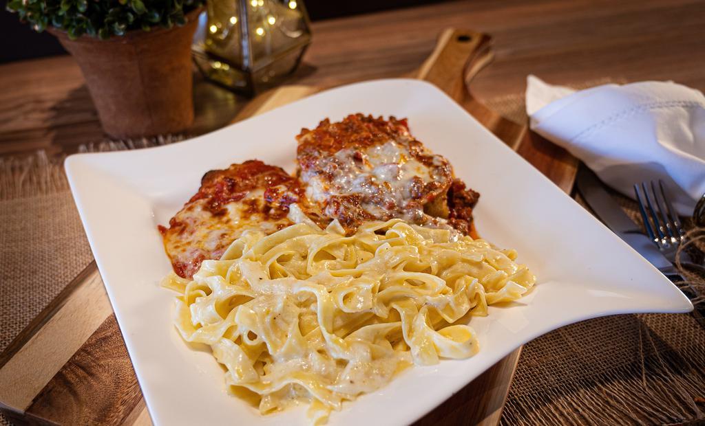 Tour Of Italy · Chicken parmigiana, lasagna and our delicious fettuccine Alfredo. All meals come over a bed of noodles.
