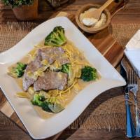 Veal Carciofi · Thin sliced veal sautéed with fresh broccoli and artichokes along with our signature white w...