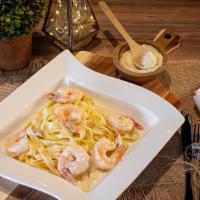 Shrimp Alfredo · Delicious combination of shrimps and egg fettuccine noodles served with an exquisite creamy ...