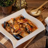 Zuppa Di Pesce · Delicious combination of sautéed seafood consisting of mussels, clams, crab meat, scallops, ...