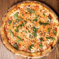 Margherita Pizza · Vegetarian. Tomato sauce, fresh mozzarella, and basil.