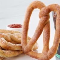 Flavored Pretzel Combo · Combos include a regular drink and your choice of sauce.