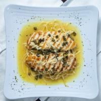 Chicken Piccata · Chicken breast sauteed with white wine, lemon sauce, and capers.