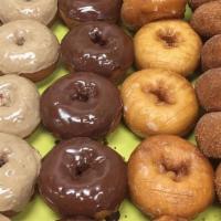 One Dozen Mixed Cakes Donuts +2 Extra Free · -One Dozen Mixed Cakes Donuts +2 EXTRA FREE
-Hot donuts out of the fryer. Always glazed righ...