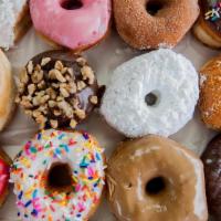 One Dozen Mixed Donuts +4 Extra Free · -One Dozen Mixed Donuts +4 EXTRA FREE
Glazed Donuts, Chocolate Ice Donuts, Icing and Sprinkl...