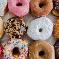 One Dozen Mixed  Donuts +4 Extra Free · -One Dozen Mixed  Donuts +4 EXTRA FREE
-Includes Glazed Donuts, Chocolate Ice Donuts, Icing ...