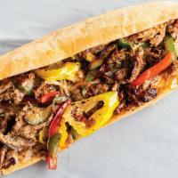Tex-Mex Cheese Steak · Thin-Sliced Beef with peppers, Onions, Pepperjack Cheese, Jalapeños, & Chipotle Mayo