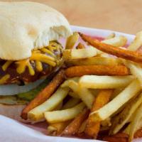 Rosedale Burger · A cheddar mesquite burger topped with sliced onions, pickles, cheddar cheese, and sweet mesq...