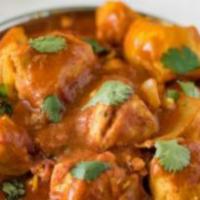Chicken Madras Curry · Spicy chicken in a curry sauce.