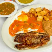 Pork Chop Plate · Two center-cut pork chops well cooked and topped with ranchero sauce.