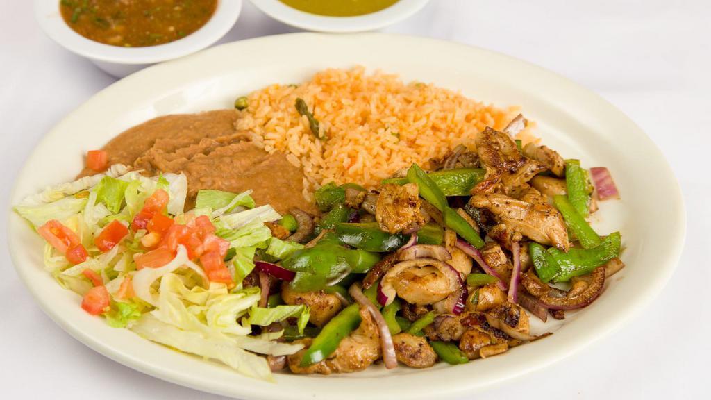 Monterrey Chicken Plate · Seasoned grilled chicken breast covered with spicy ranchero sauce and topped with white cheese.