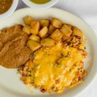 Green Enchiladas Plate · Three chicken enchiladas, covered with our special tomatillo sauce and Monterey Jack cheese.
