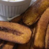 Tajadas · Fried sweet plantain.