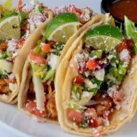 Baja Fish Tacos - Cod · Double stacked warm corn tortillas spread with chipotle aioli and layered with seasoned cod,...