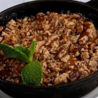 Whiskey Apple Crumble · Whiskey glazed Granny Smith apples, baked with a cinnamon-pecan. streusel topping with salte...