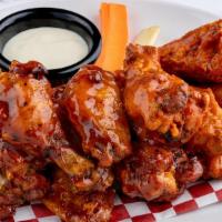 12 Bone-In Killer Wings · BONE-IN WINGS. Served with carrots sticks, celery sticks, bleu cheese or ranch dressing. MAN...