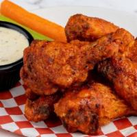 6 Bone-In Killer Wings · BONE-IN WINGS. Served with carrots sticks, celery sticks, bleu cheese or ranch dressing. MAN...
